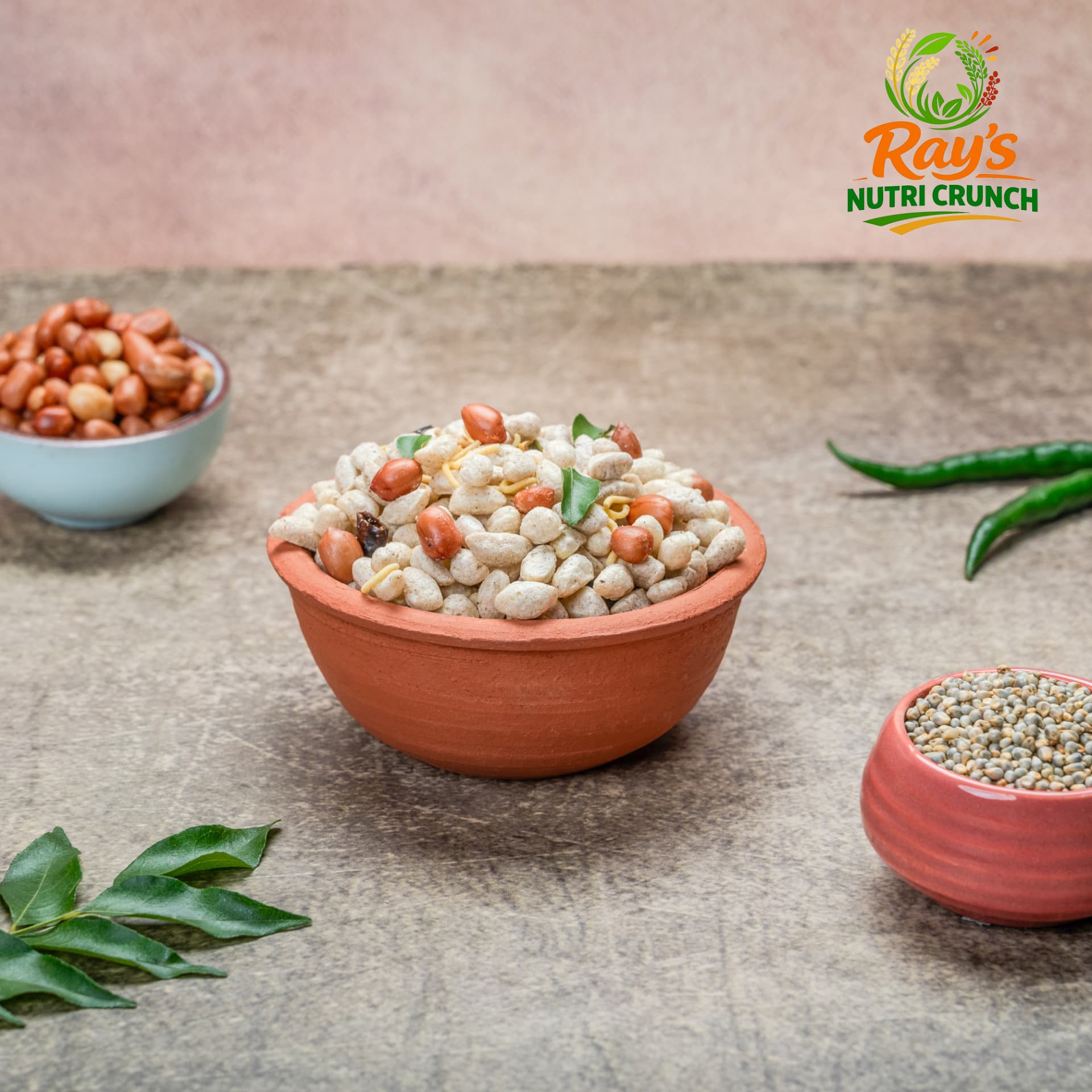 Puffed millet chivda in a terracotta bowl with curry leaves