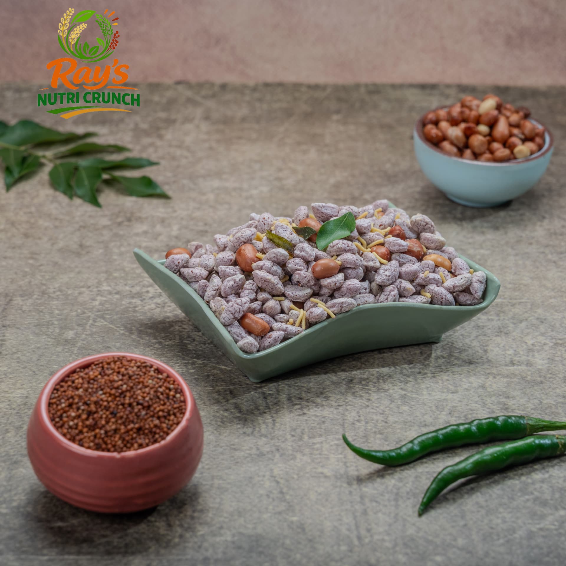 Ragi millet chivda in a green dish with red millet